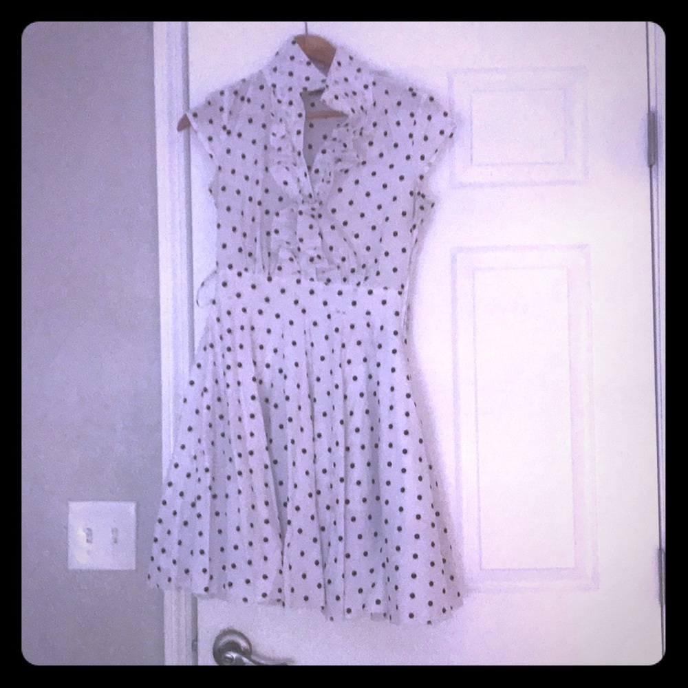 A black and white polka dotted dress.
